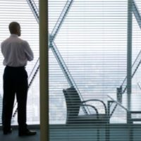man standing inside an office